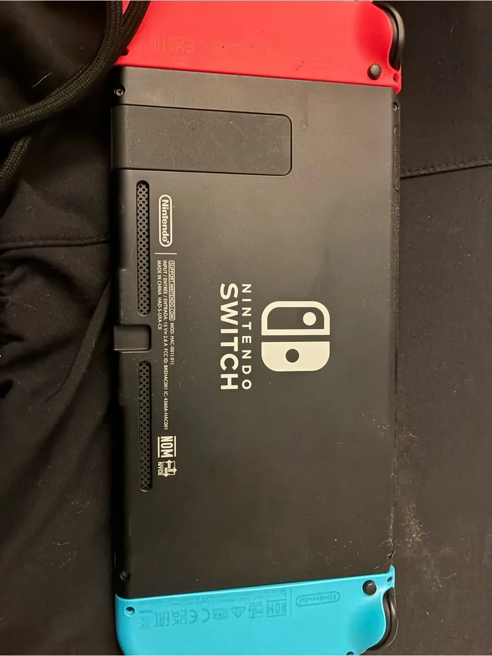 Nintendo Tablet with Neon Red and Neon Blue Joy‑Con Controllers